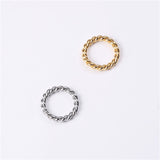 Golden steel-colored stainless steel twist ring