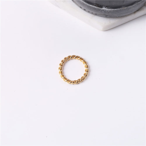 Golden titanium steel twist ring