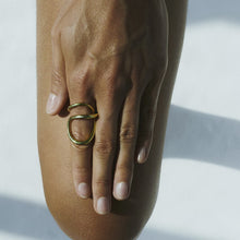 Load image into Gallery viewer, A stainless steel 18K gold ring with geometrically twisted lines