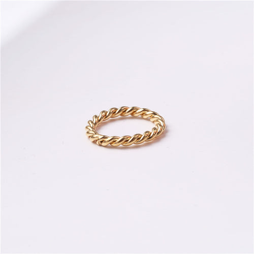 Golden titanium steel twist ring