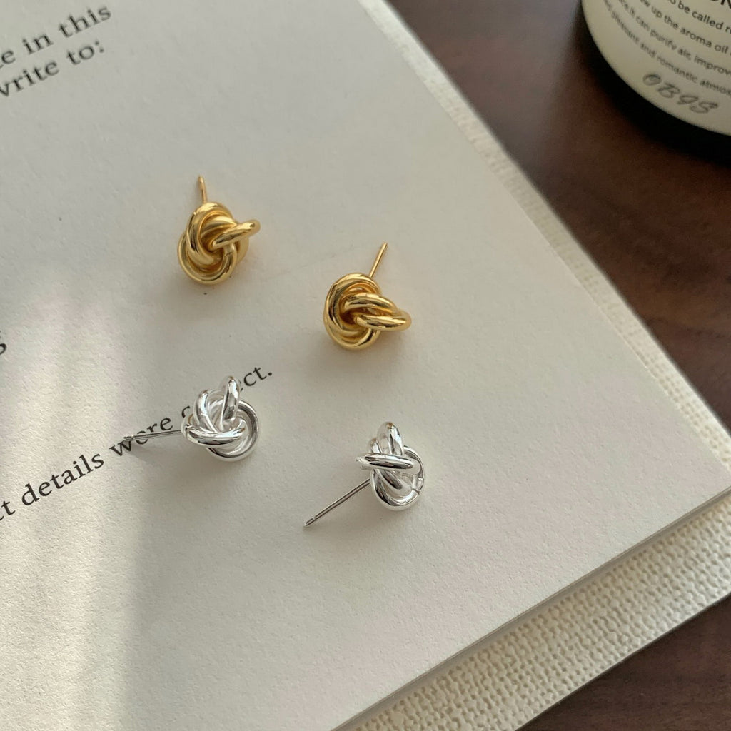 Tie a pair of S925 sterling silver knots around the twisted ear studs