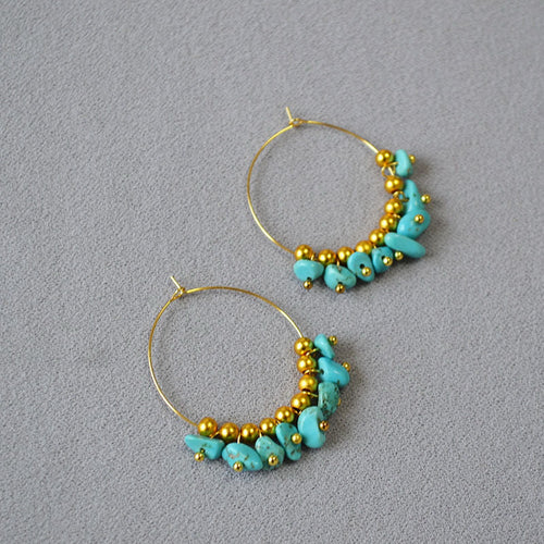 Irregular turquoise crushed stone beaded circle earrings