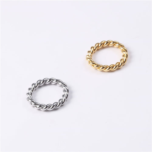 Golden steel-colored stainless steel twist ring