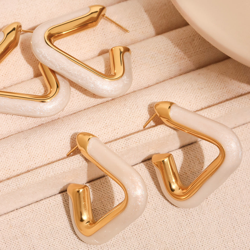 Stainless steel oil-dripping white triangular hollow earrings