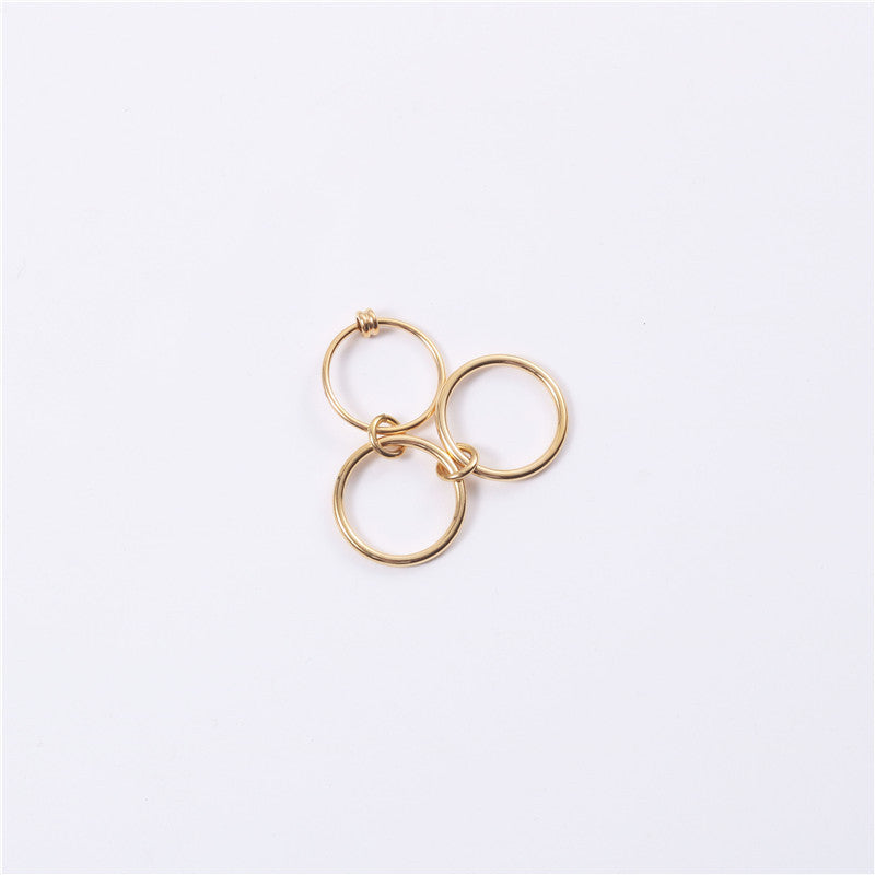 A golden three-ring ring