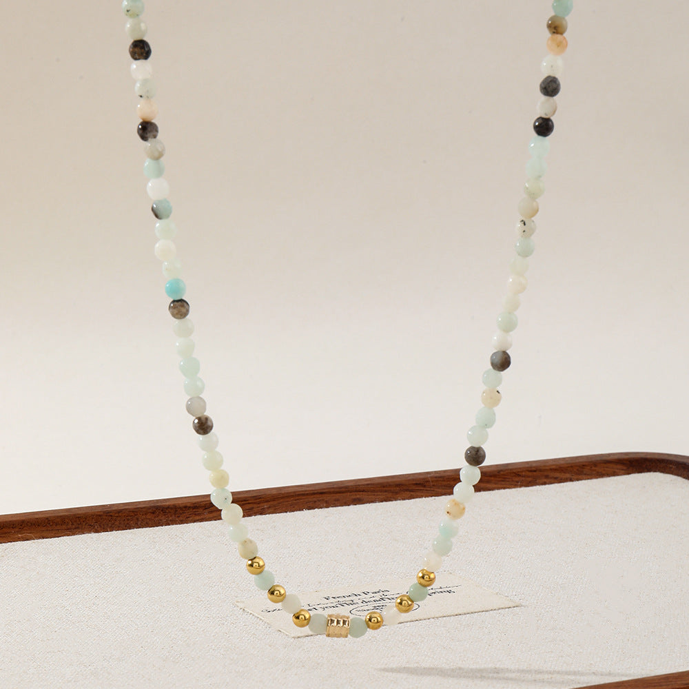 A round 4mm natural stone beaded necklace made of 18K gold plated with copper