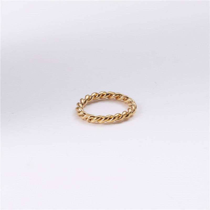 Golden titanium steel twist ring