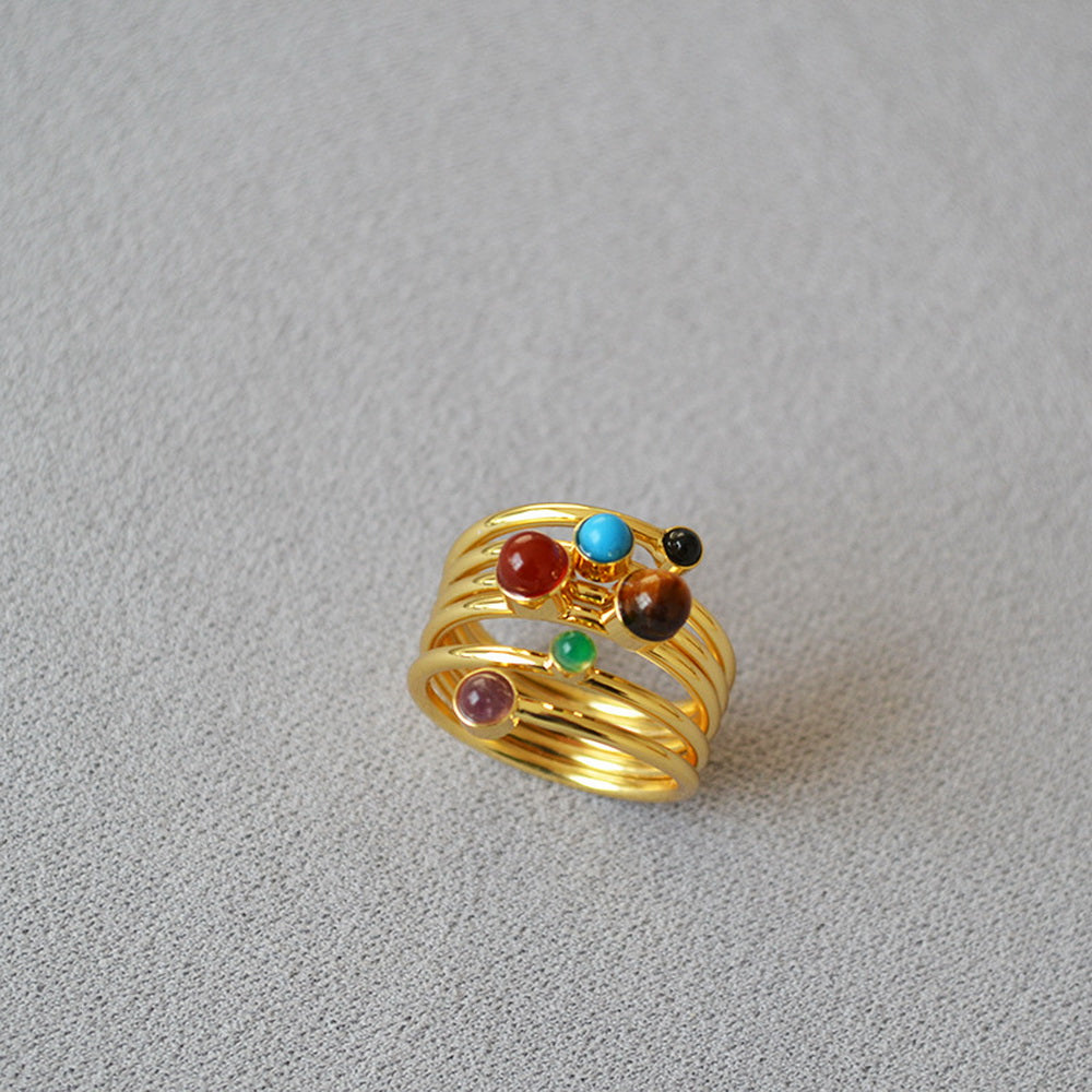A multi-layer wound line inlaid natural stone brass gold-plated ring