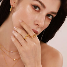 Load image into Gallery viewer, A golden stainless steel three-dimensional rose flower opening ring