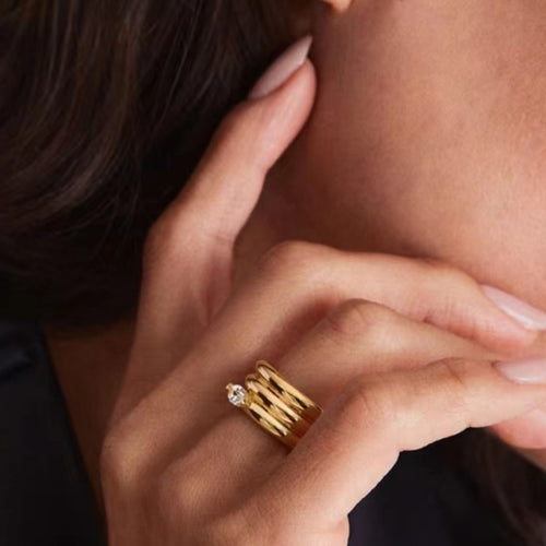 18K gold stainless steel spiral arc surface three-ring zirconium-set ring