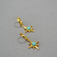Load image into Gallery viewer, Octagonal star inlaid with turquoise and gilded brass ear buckles