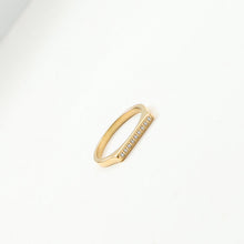 Load image into Gallery viewer, A golden stainless steel D-shaped ring set with fine diamonds