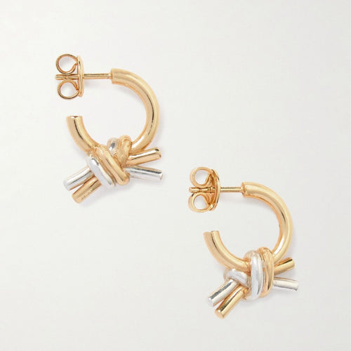 Golden ring-shaped twisted copper earrings