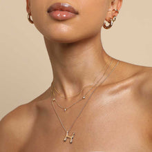 Load image into Gallery viewer, A golden stainless steel H-letter necklace