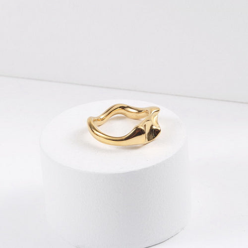 A golden stainless steel design abstract irregular-shaped ring