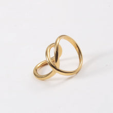 Load image into Gallery viewer, A stainless steel 18K gold ring with geometrically twisted lines
