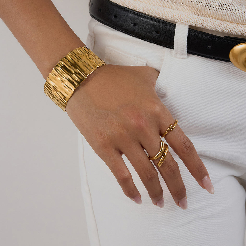 Golden stainless steel wide-faced bracelet