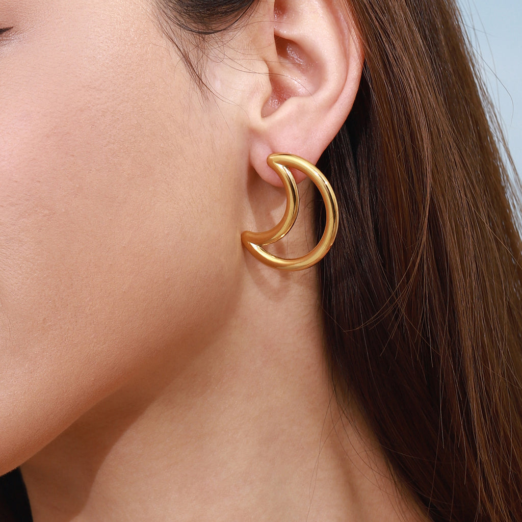 Stainless steel star and moon perforated earrings