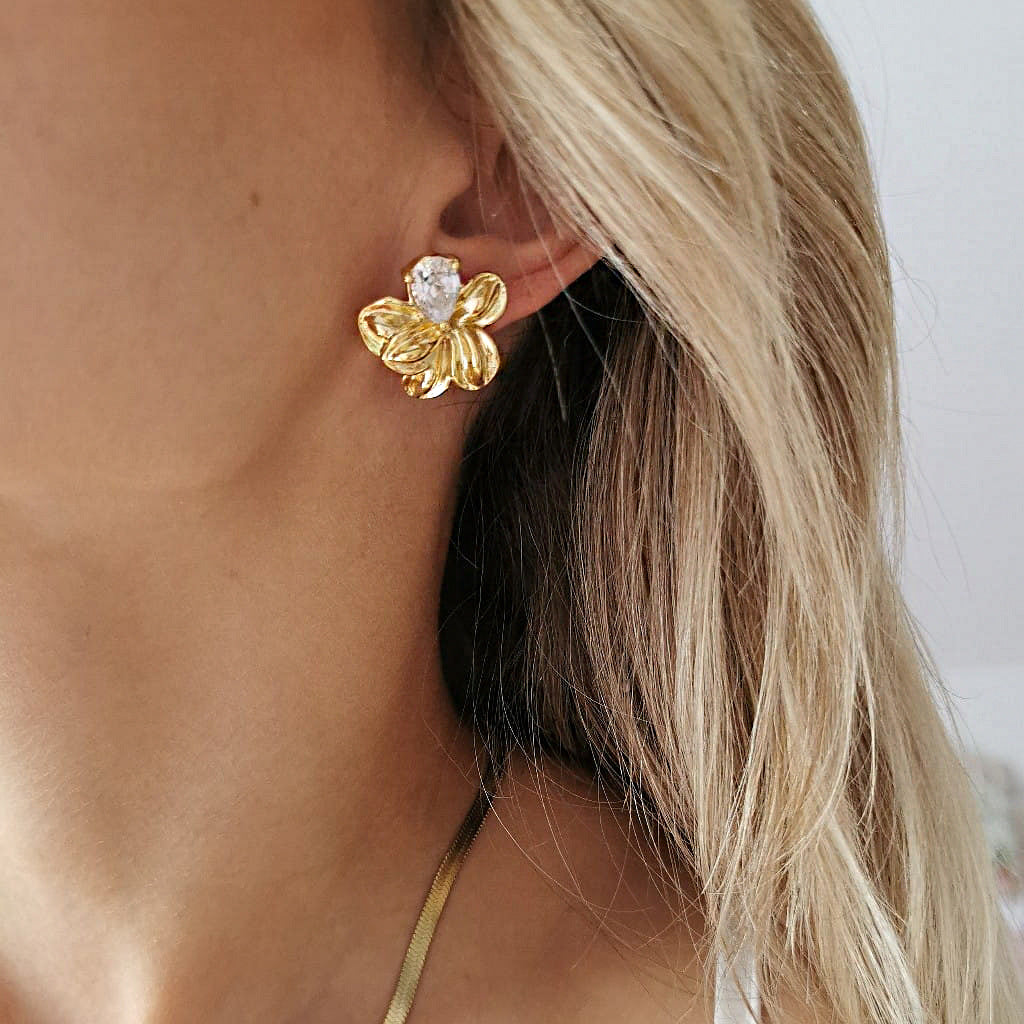 Golden stainless steel flower white zircon earrings and stud earrings