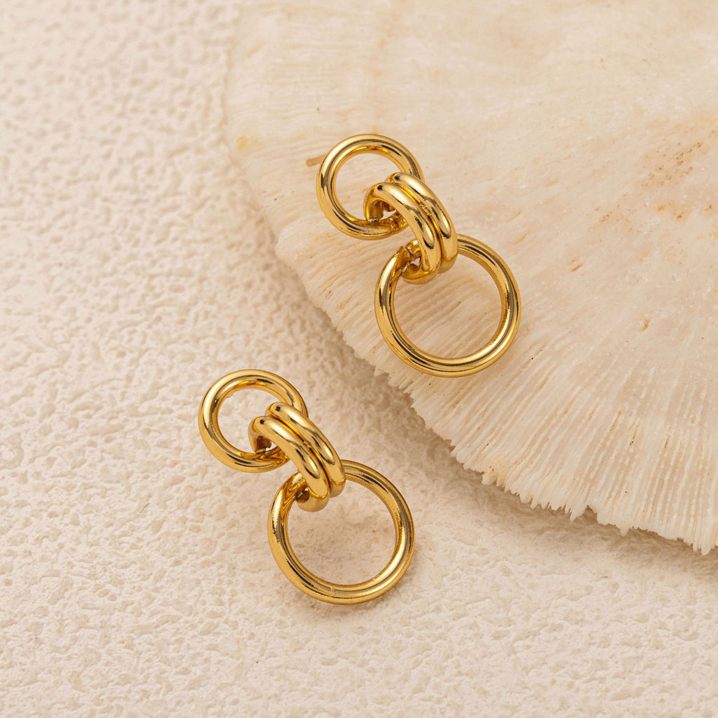 Stainless steel perforated circular earrings