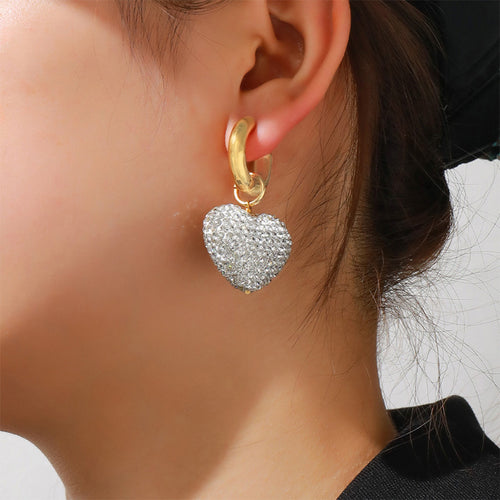 Diamond-encrusted three-dimensional heart pendant earrings