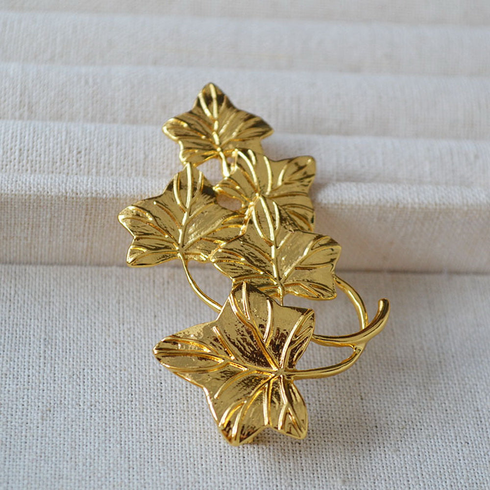 Vine, grape and leaf coat brooch