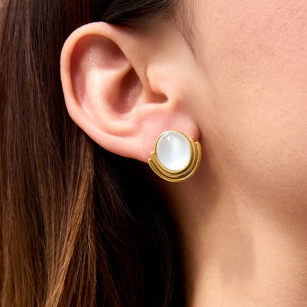 A pair of stainless steel cat-eye stone stud earrings