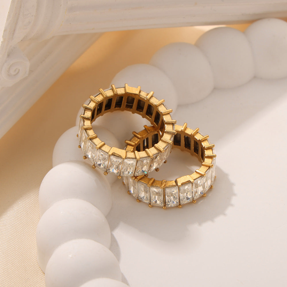 Stainless steel ring set with zircon