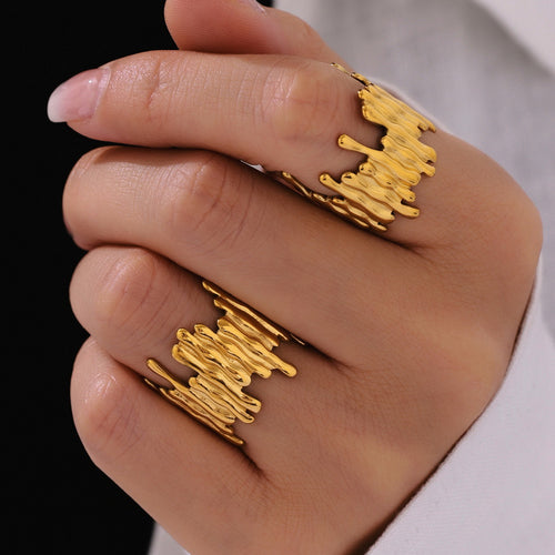 A golden stainless steel cold style irregularly opened ring