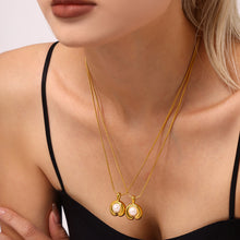 Load image into Gallery viewer, A C-shaped freshwater pearl pendant necklace made of stainless steel plated with 18K gold