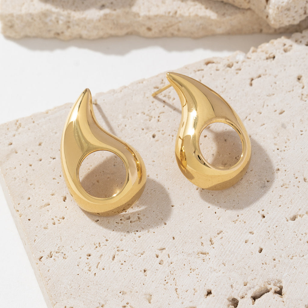 Golden stainless steel perforated teardrop earrings
