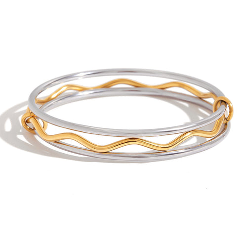 Stainless steel, gold and silver multicolored bracelets can be stacked and worn