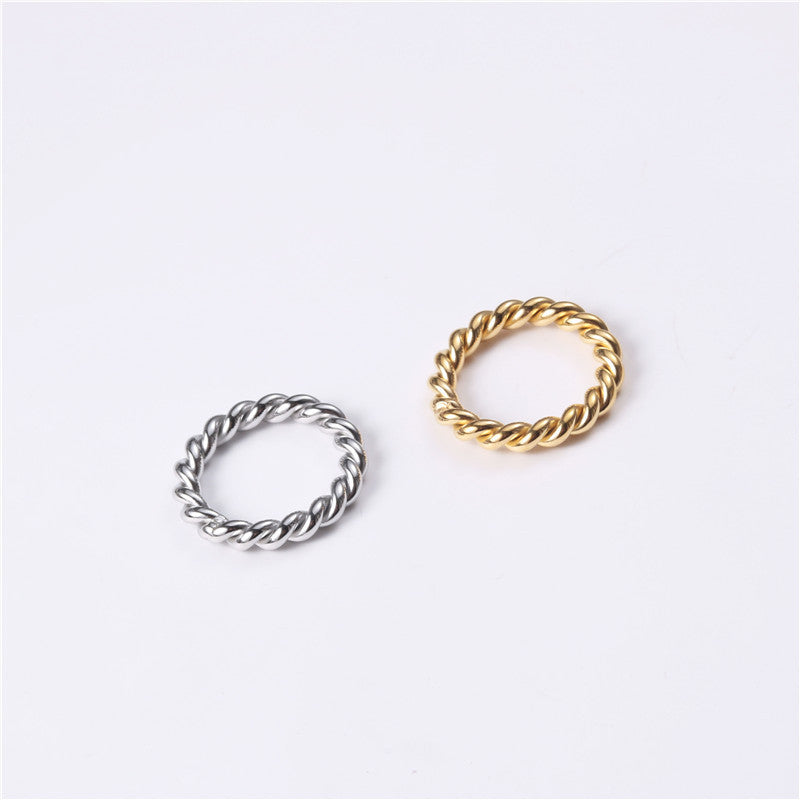 Golden steel-colored stainless steel twist ring