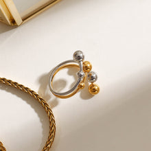 Load image into Gallery viewer, A double-layer ring made of stainless steel, gold and silver, with large and small steel balls
