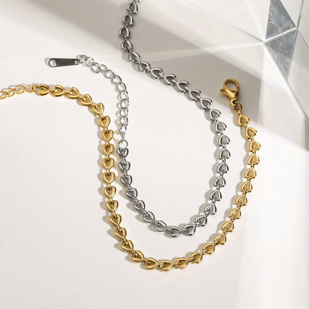 Stainless steel golden steel color hollow heart woven bracelet