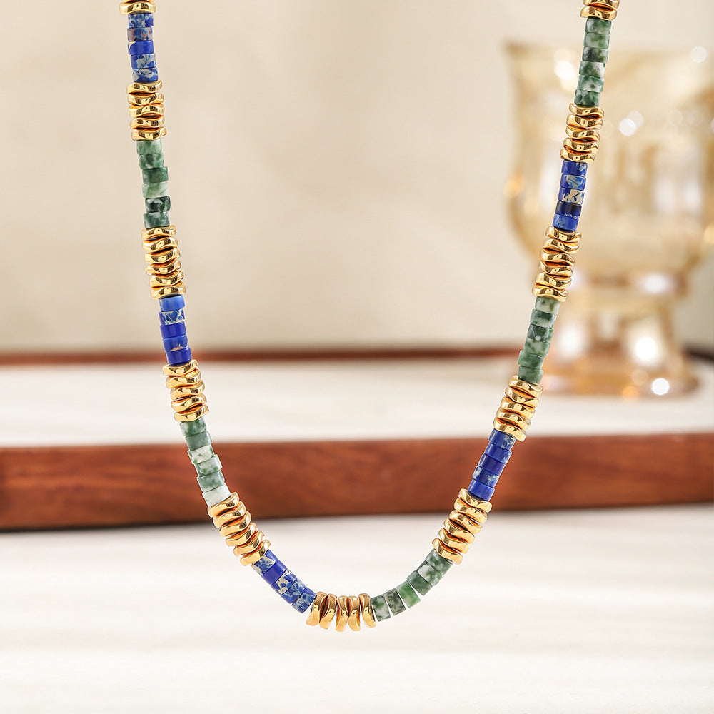 A hand-beaded necklace made of colored natural stone