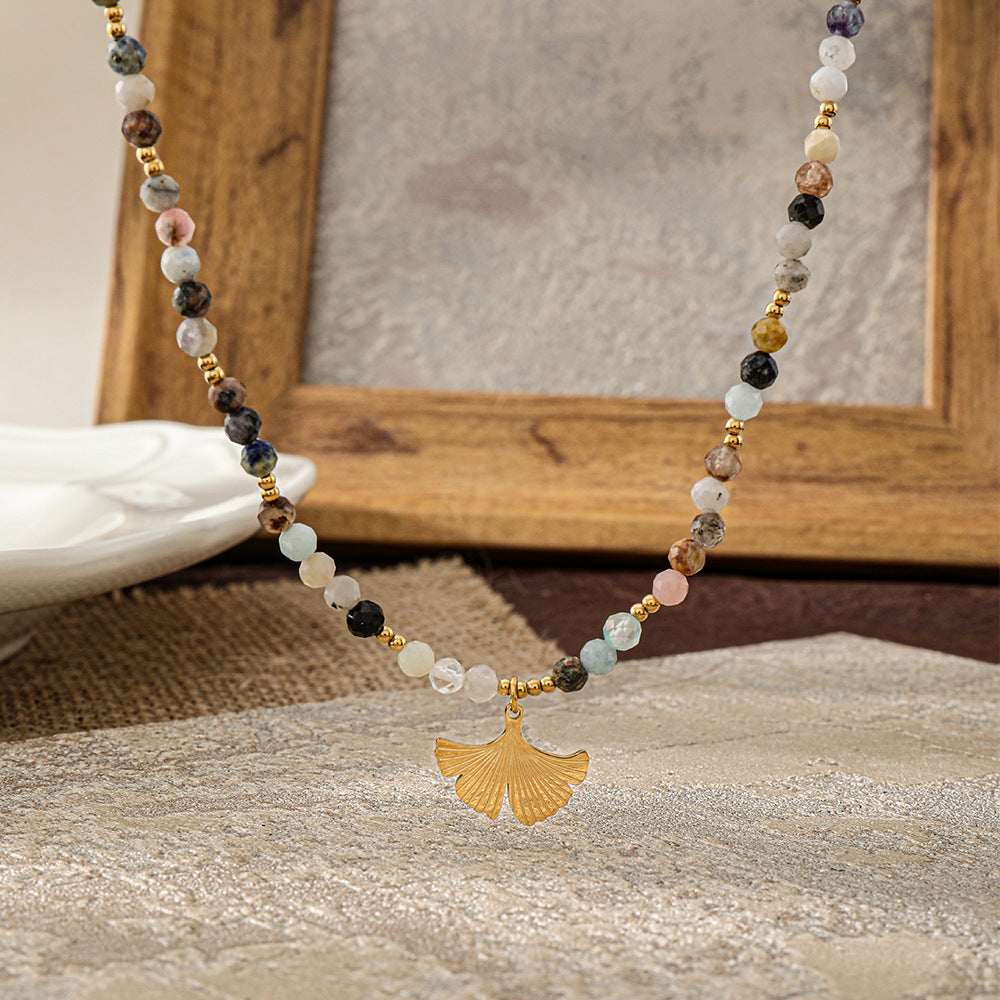 A hand-beaded necklace made of colored natural tourmaline