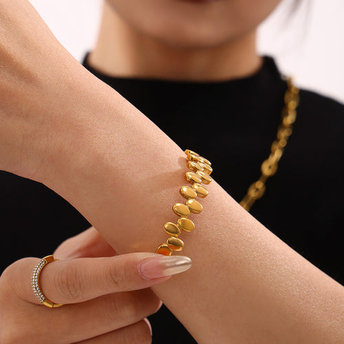 Golden stainless steel polka dot clasp bracelet