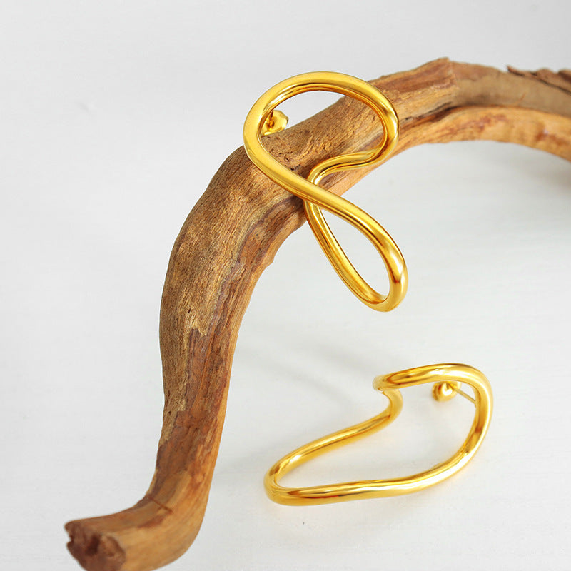 Golden stainless steel irregular-shaped encircling exaggerated earrings