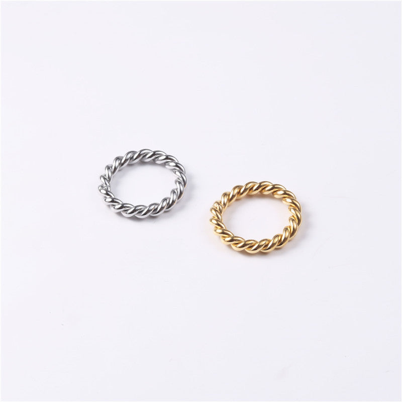 Golden steel-colored stainless steel twist ring
