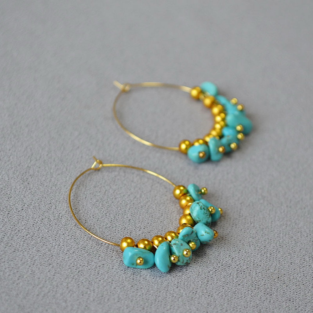 Irregular turquoise crushed stone beaded circle earrings