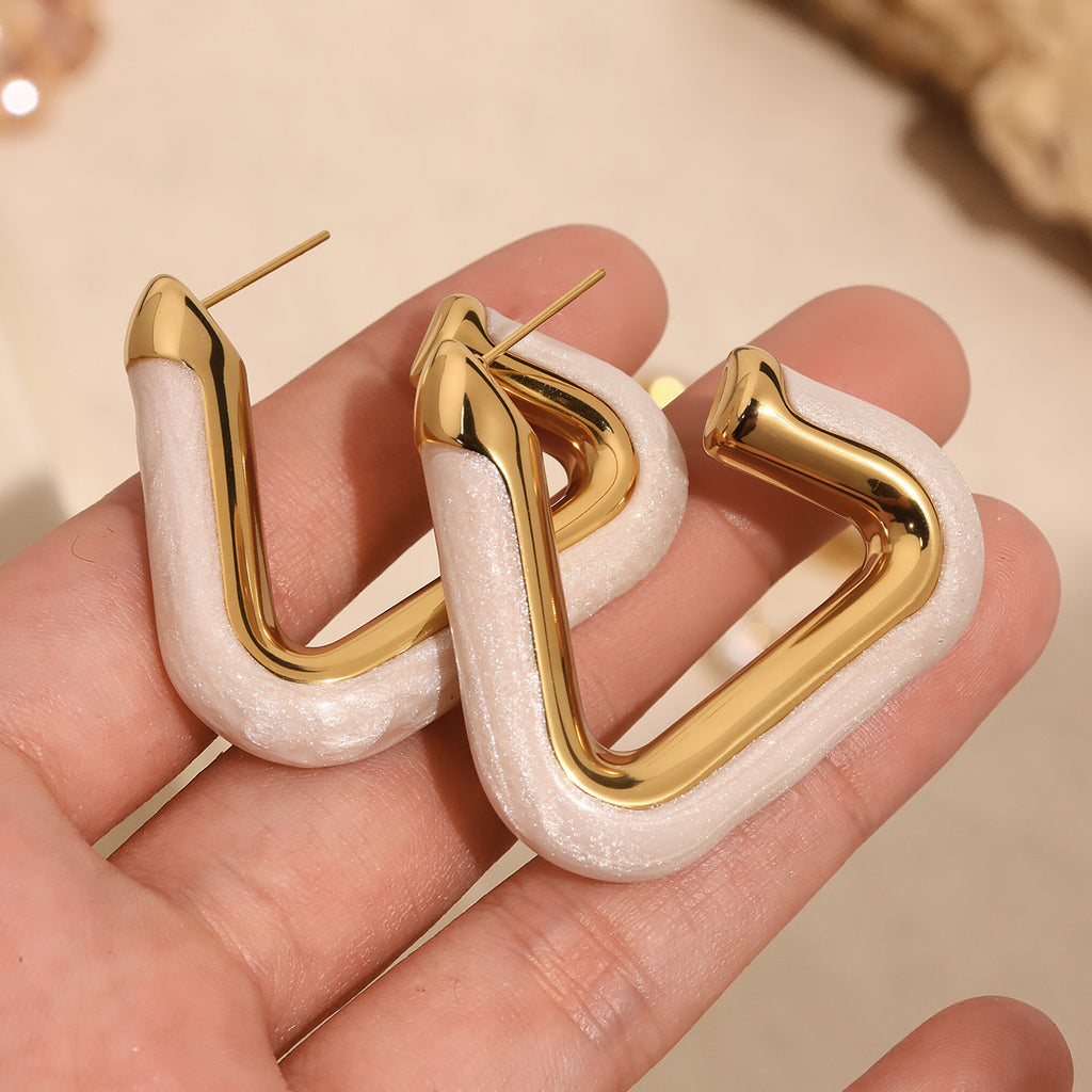 Stainless steel oil-dripping white triangular hollow earrings