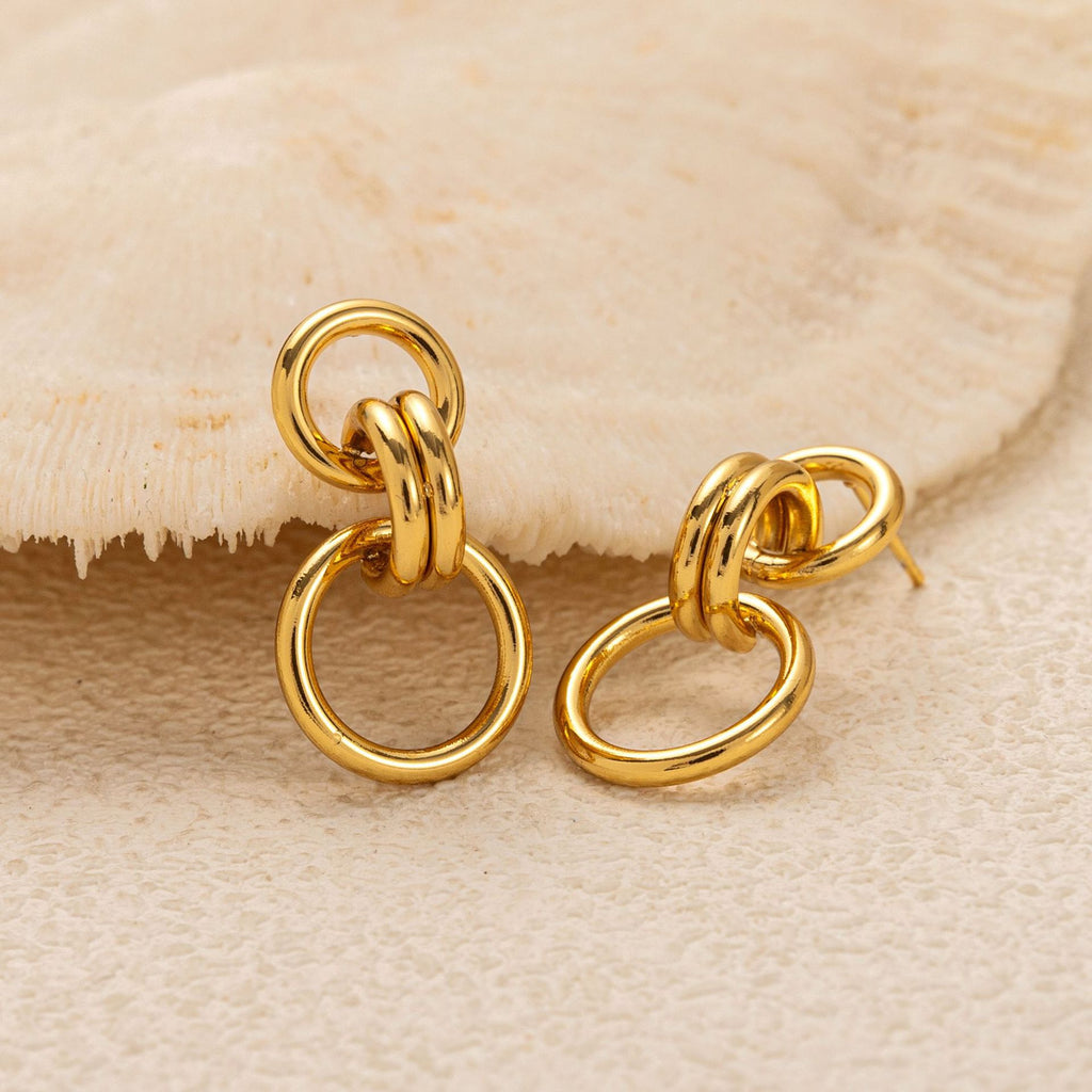 Stainless steel perforated circular earrings