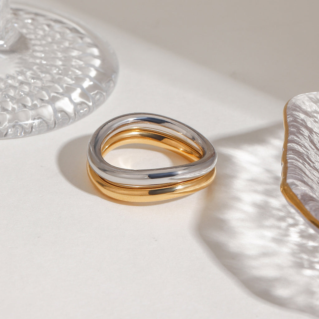 A 2-piece set of stainless steel rings in golden steel color