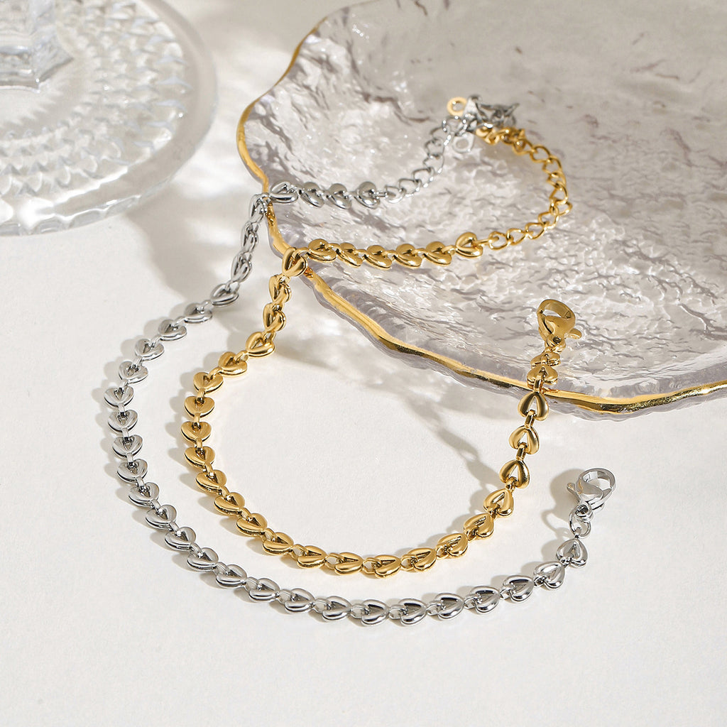 Stainless steel golden steel color hollow heart woven bracelet
