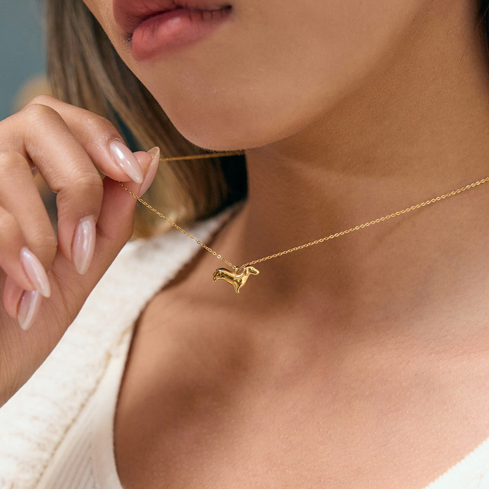 A cute golden stainless steel dog pendant necklace