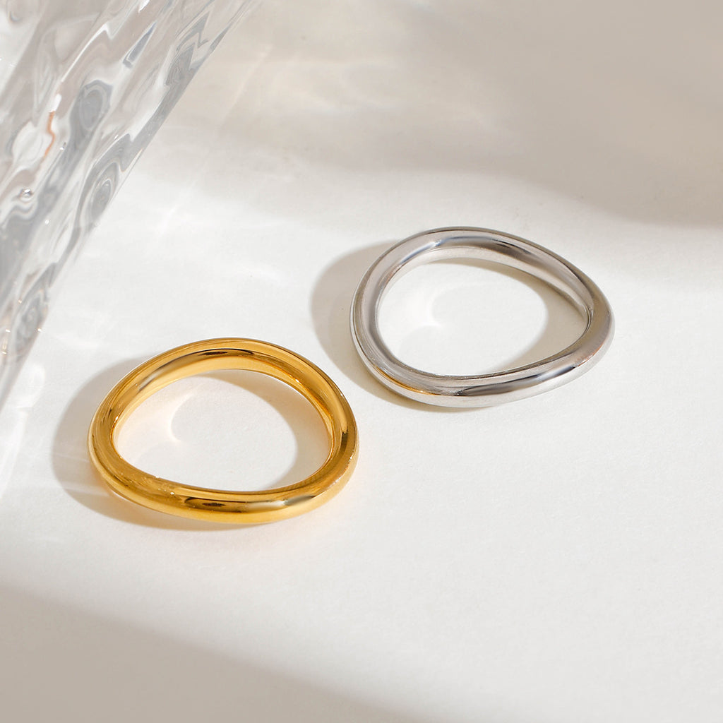 A 2-piece set of stainless steel rings in golden steel color