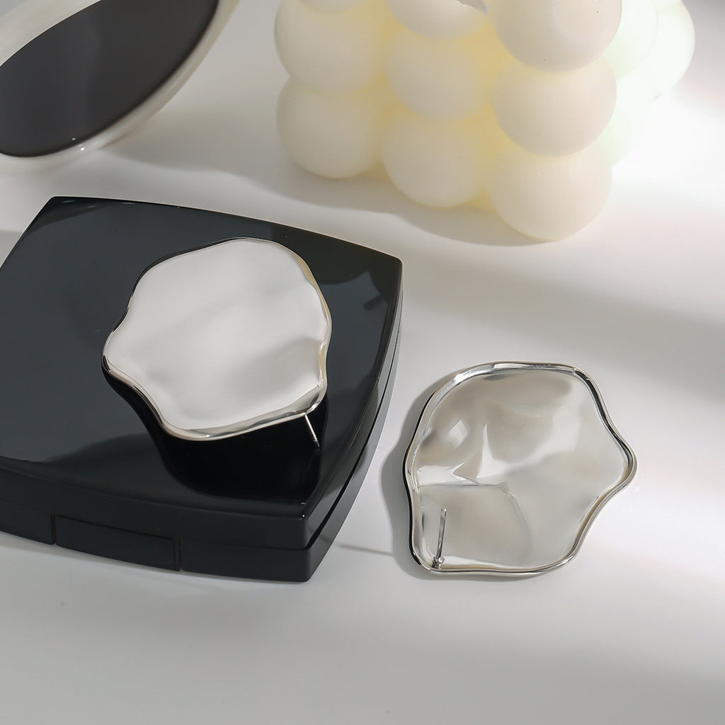 Exaggerated large polished stainless steel earrings