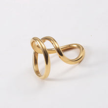 Load image into Gallery viewer, A stainless steel 18K gold ring with geometrically twisted lines