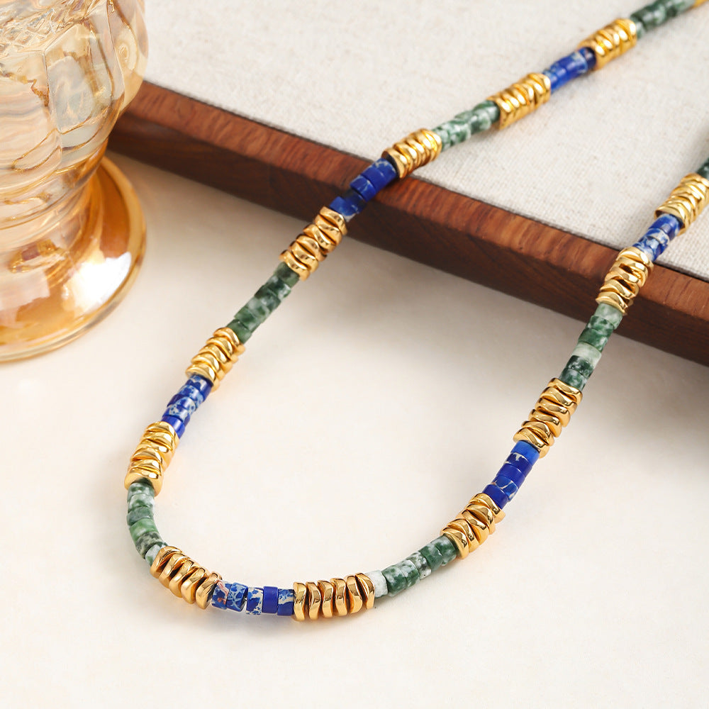 A hand-beaded necklace made of colored natural stone